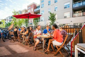 A bike tour eats a meal on a patio.