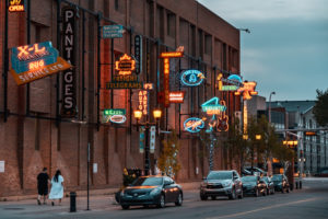 Edmonton A couple walks by the Neon Sign Museum