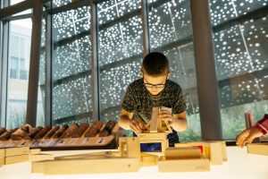 Child playing with building blocks at the Royal Alberta Museum