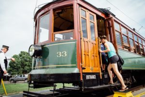 People board the High Level Bridge Streetcar.