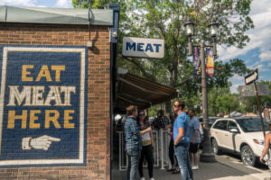 People wait in line outside of Meat.