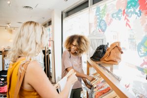 Two women shop at Bamboo Ballroom on Whyte Ave.