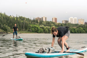 Edmonton River Valley Stand Up Paddleboard Man And Woman cropped