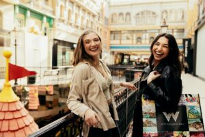 Two people stand in West Edmonton Mall