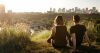 A couple stares out at the North Saskatchewan River Valley in Edmonton.