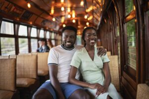 A couple sits inside the High Level Bridge streetcar trolley.