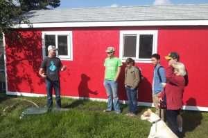 People on a tour at the Edmonton Urban Farm