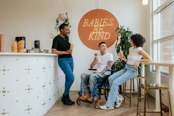 Three people inside Kind Ice Cream.